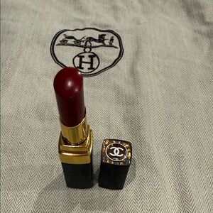CHANEL Deep Red Lipstick with Gold Detail